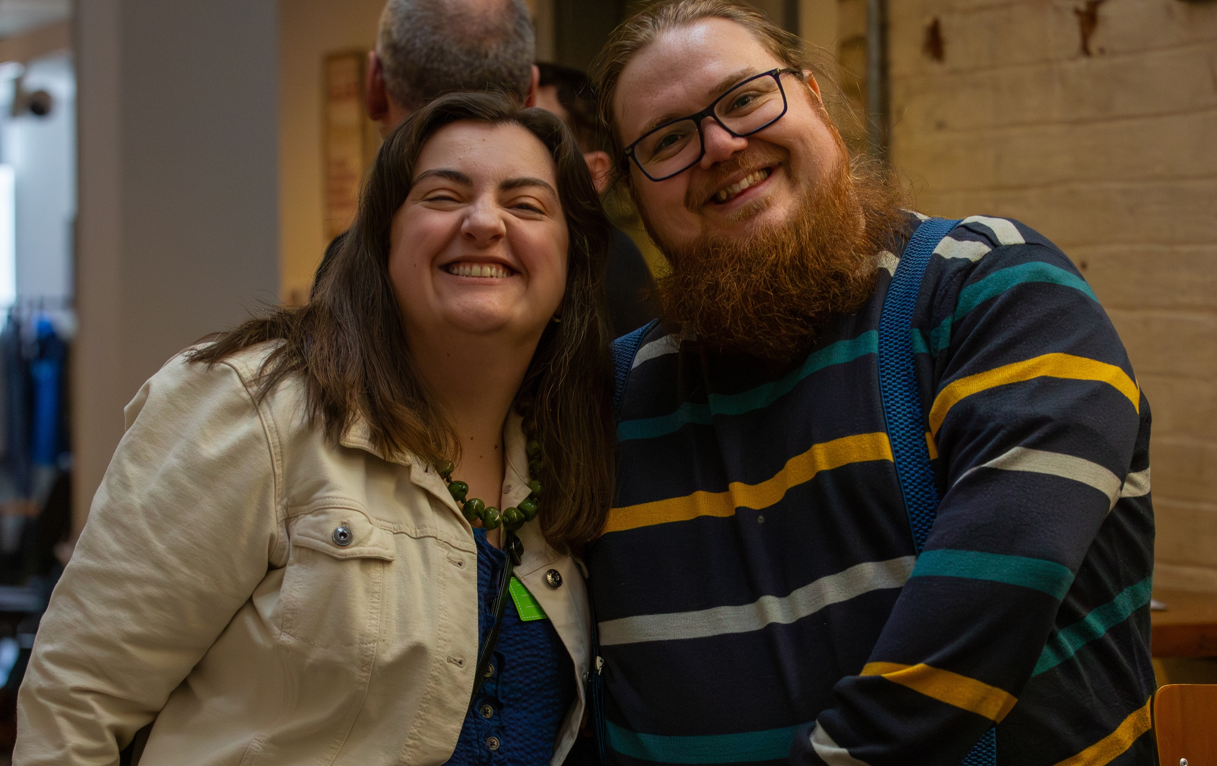 Smiling attendees at the Atelier, enjoying the talks and workshops